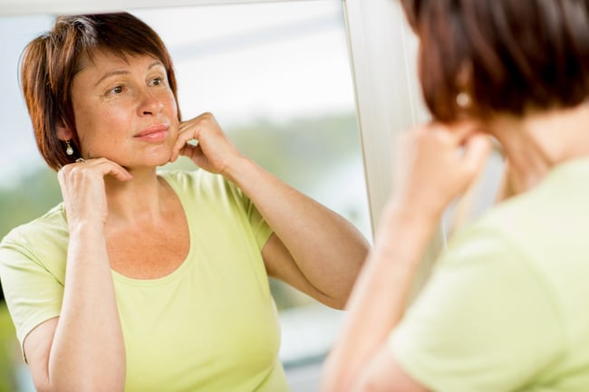 Woman in Green with Mirror